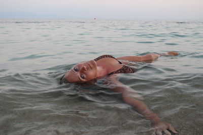 Woman relaxing on beach