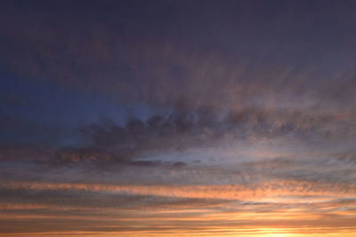 Low angle view of dramatic sky during sunset