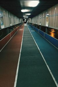 Empty illuminated underground walkway