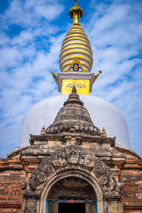 Low angle view of temple building against sky
