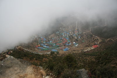 High angle view of mountain range from namche bazaar against sky