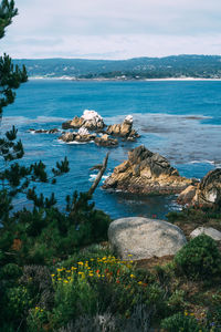 Scenic view of sea against cloudy sky