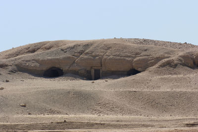 Scenic view of desert against clear sky