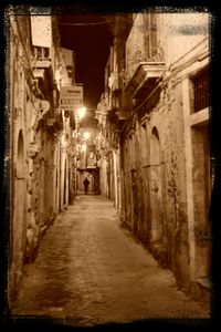 Narrow alley along buildings