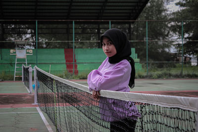 Full length of a girl playing with ball