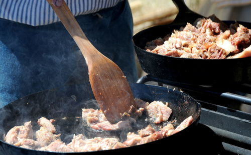 Dutch oven cooking outdoors in the country.