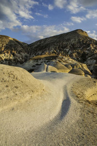 Scenic view of desert against sky