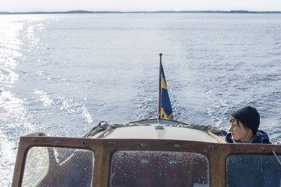 Woman on boat, sweden