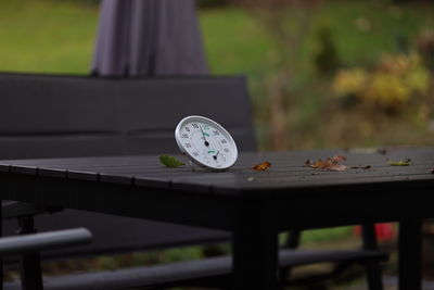 Close-up of thermometer on table