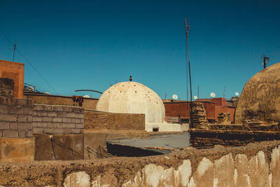 View of old building against blue sky