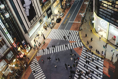 High angle view of people crossing road