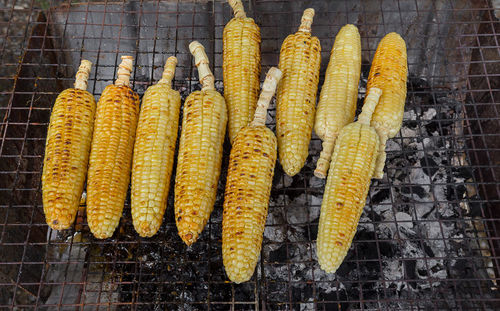 High angle view of meat on barbecue grill