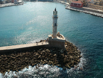 High angle view of lighthouse on sea