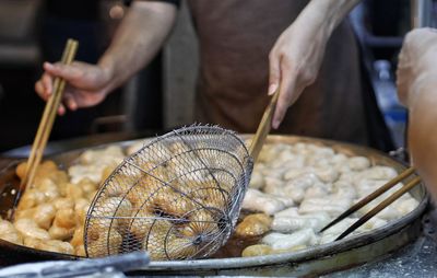 Midsection of person preparing food