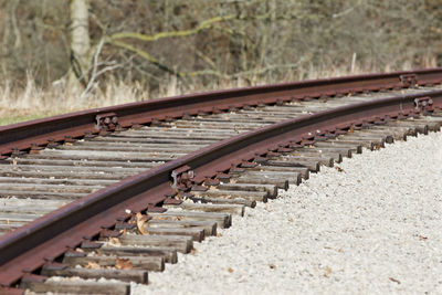 Railroad track during sunny day