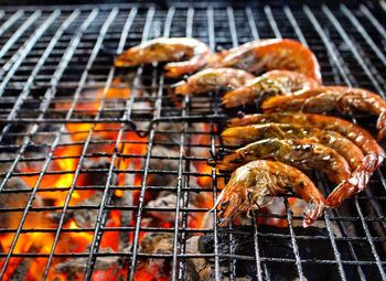 Close-up of meat on barbecue grill