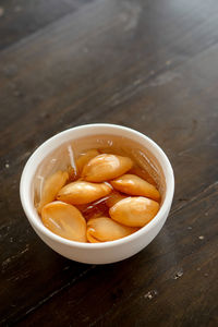 High angle view of fruits in bowl on table