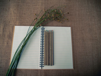 High angle view of open book on table