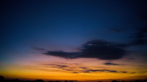 Low angle view of dramatic sky at sunset