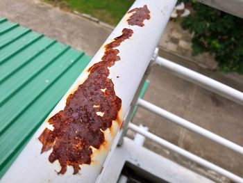 High angle view of bread on metal railing