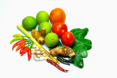 Close-up of fruits against white background