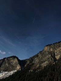Low angle view of mountains against sky