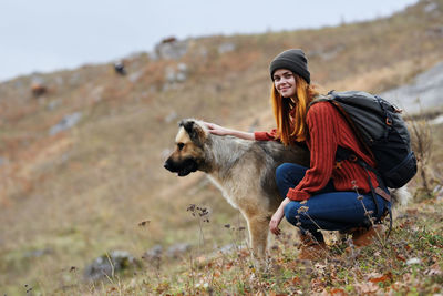 Full length of young woman on land