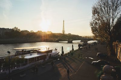 Boats in river with buildings in background