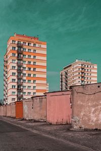 Stack of building against blue sky