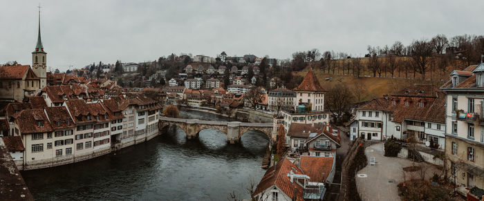 High angle view of river amidst buildings in town