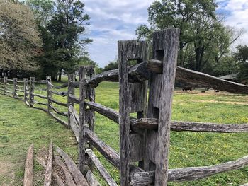 Wooden fence on field