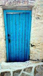 Closed wooden door of house