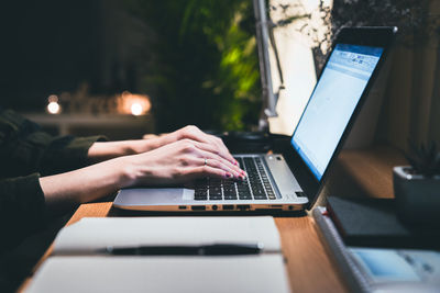 Man using laptop on table
