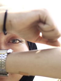 Close-up portrait of man holding camera