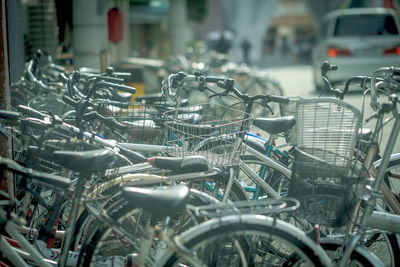 Bicycles parked on road in city
