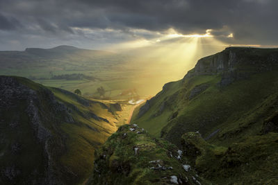 Scenic view of mountains against sky during sunset