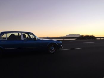 Car against sky during sunset