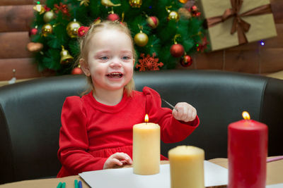 Portrait of cute girl with christmas decoration