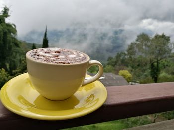 Close-up of coffee cup on table