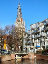 Low angle view of building against clear blue sky