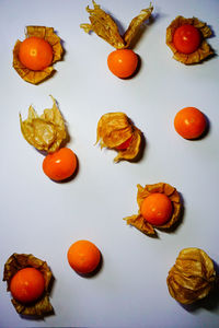 High angle view of orange fruits on table