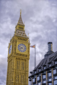 Low angle view of big ben against sky