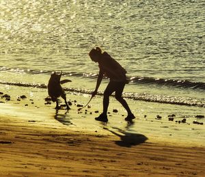 Full length of men on beach