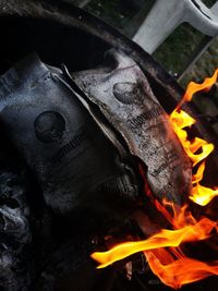 High angle view of fire on barbecue