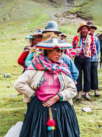 Portrait of people standing outdoors