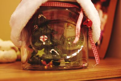 Close-up of christmas decorations on table at home