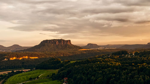 Scenic view of landscape against sky during sunset