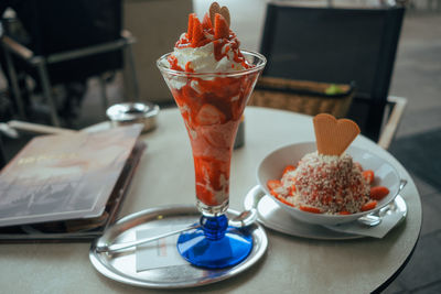 Close-up of ice cream served on table