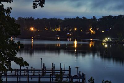 Scenic view of river against sky at night