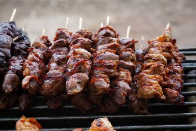 Close-up of meat on barbecue grill